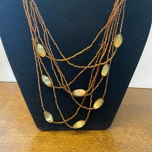 Copper seed beads with golden brown beads asymetrical statement piece necklace
